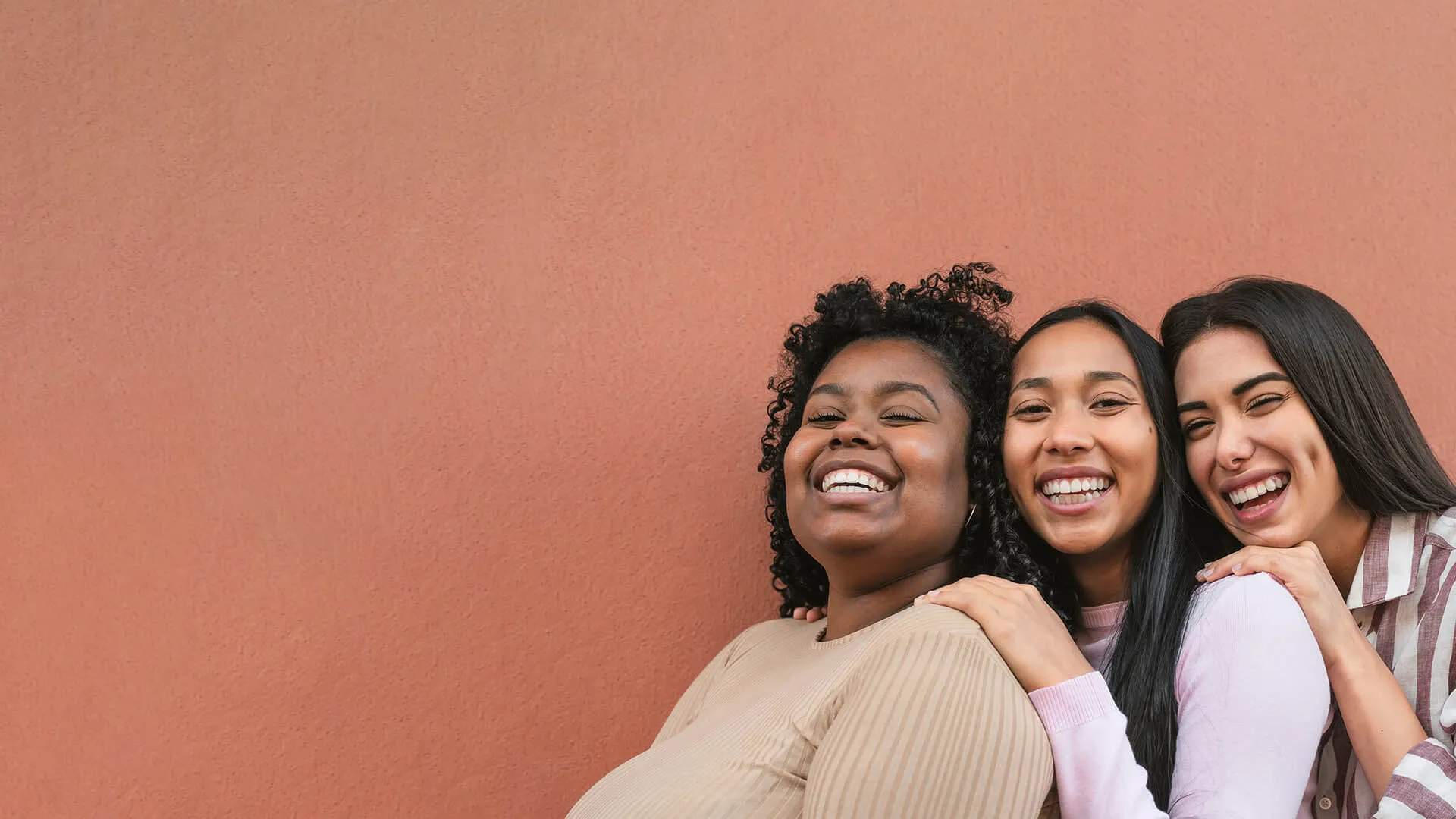a group of women smiling