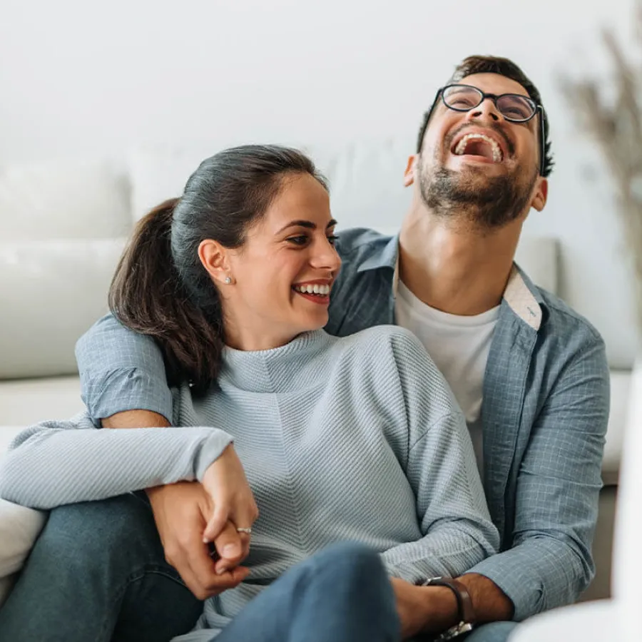 a man and woman sitting together