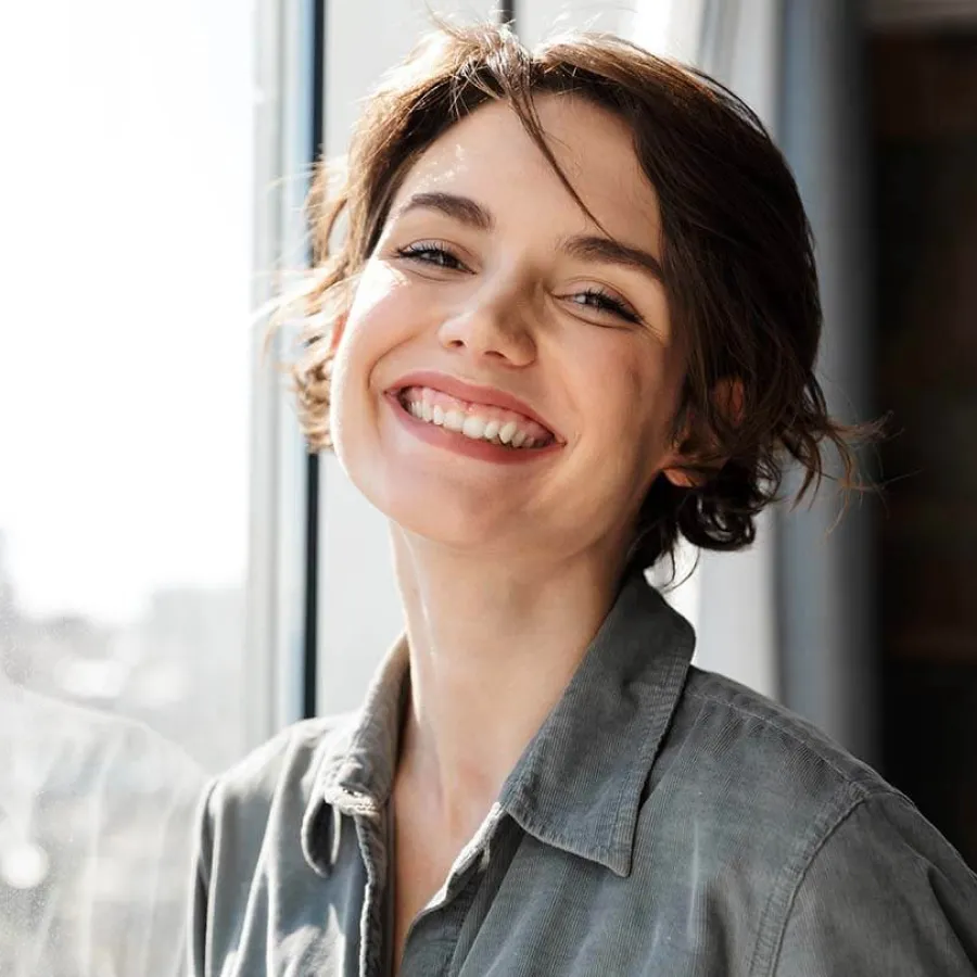 a woman smiling for the camera