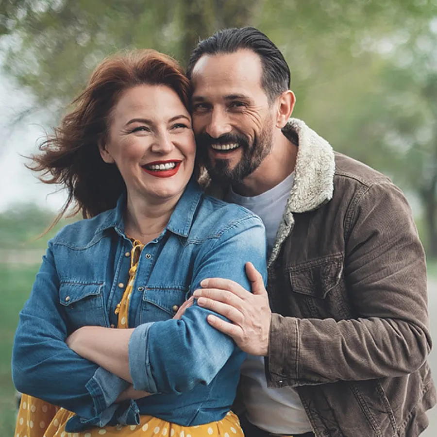 a man and woman embracing