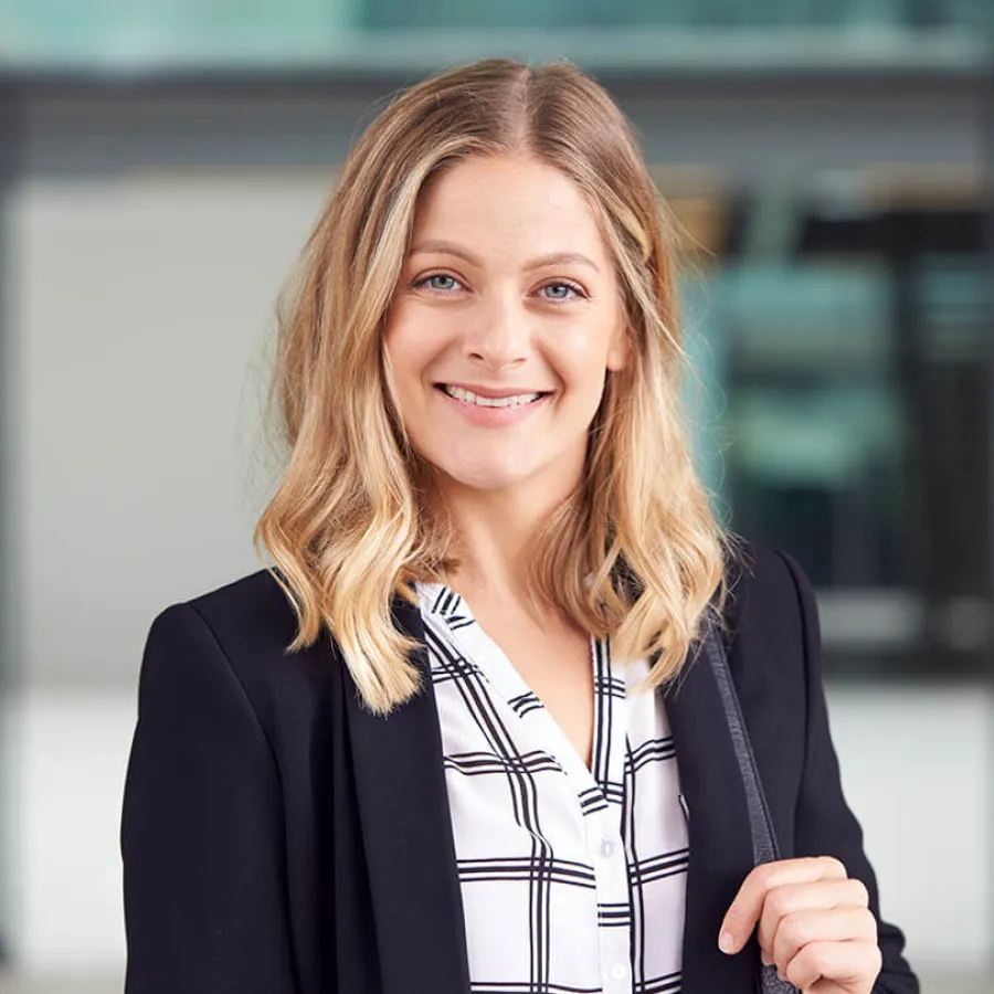 a woman smiling at the camera