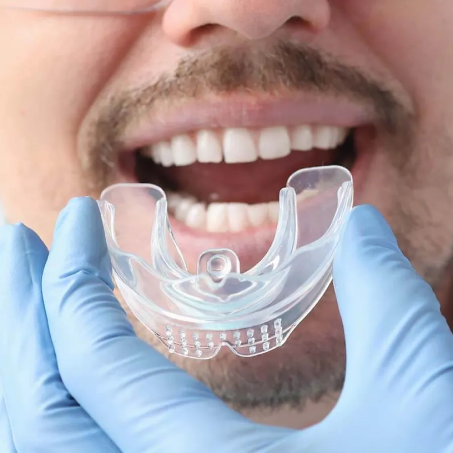 a person with a glass of water