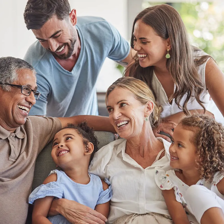 a family smiling and laughing