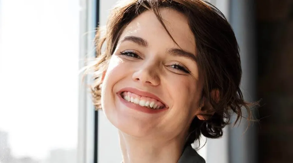 a woman smiling for the camera