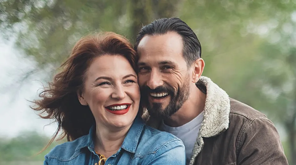 a man and woman embracing