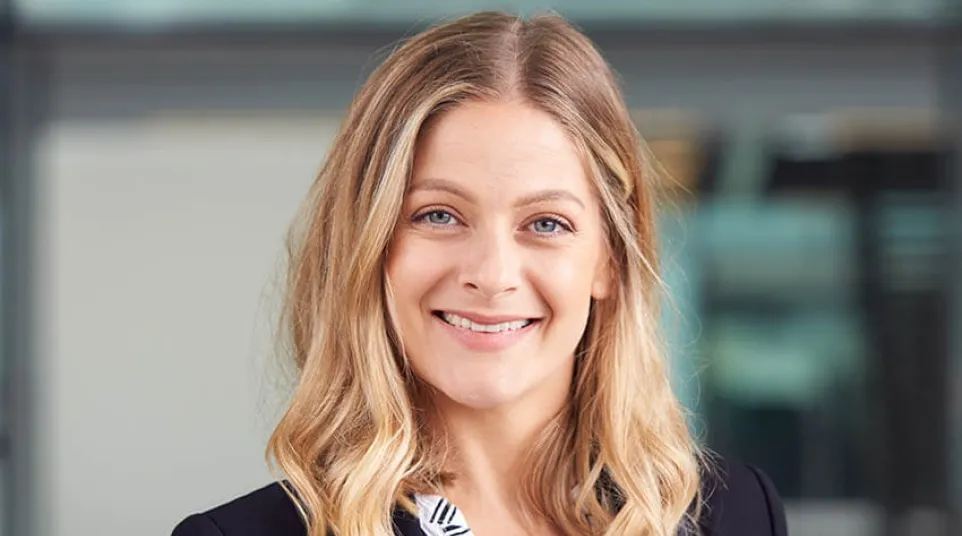 a woman smiling at the camera